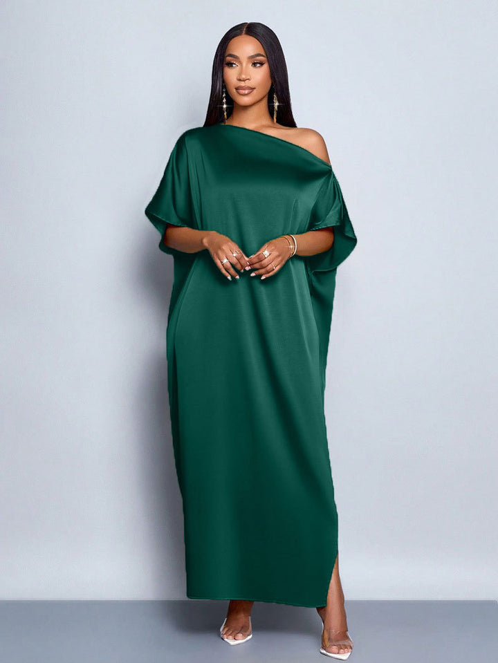Dame maxikjole med asymmetrisk snitt og elegant fall Skjora