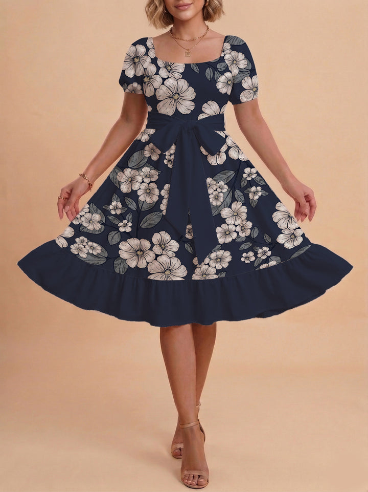 Dame Midi kjole med elegant blomstertrykk og belte i midjen Skjora