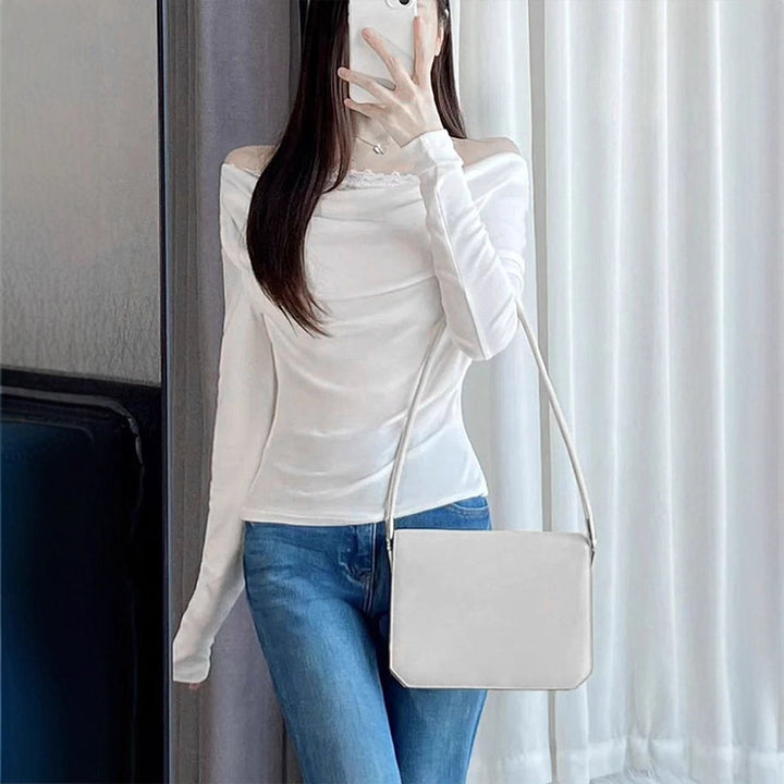 Dame langermet bluse med asymmetrisk utringning og elegant drapering Skjora
