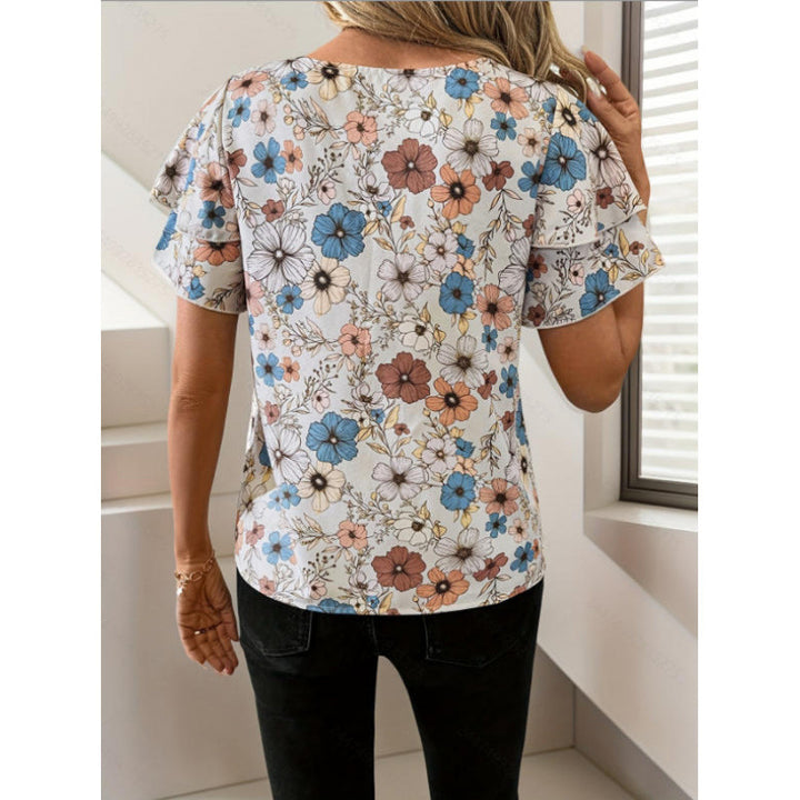 Damer kortermet bluse med volang og blomsterdesign Skjora