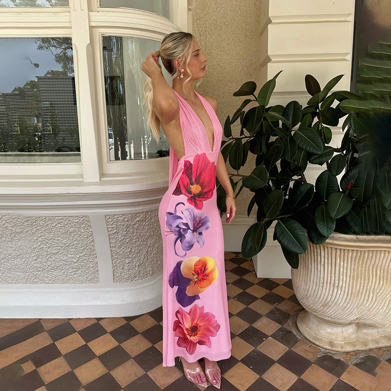 Dames maxikjole med dyp V-hals og blomsterdetaljer Skjora