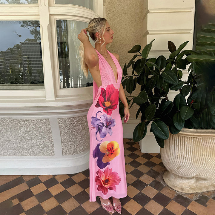 Dames maxikjole med dyp V-hals og blomsterdetaljer Skjora