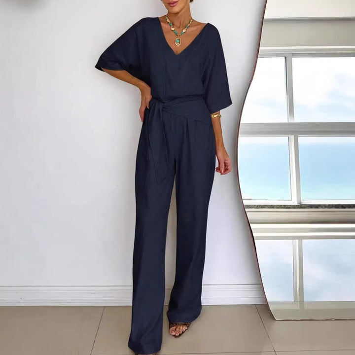Damer Elegant Jumpsuit med Skreddersydd Snitt og Innpakket Belte Skjora