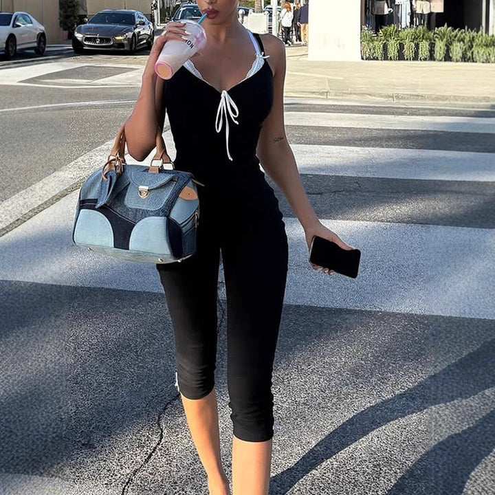 Dame gulvlengde jumpsuit med delikate volangdetaljer og justerbare stropper Skjora