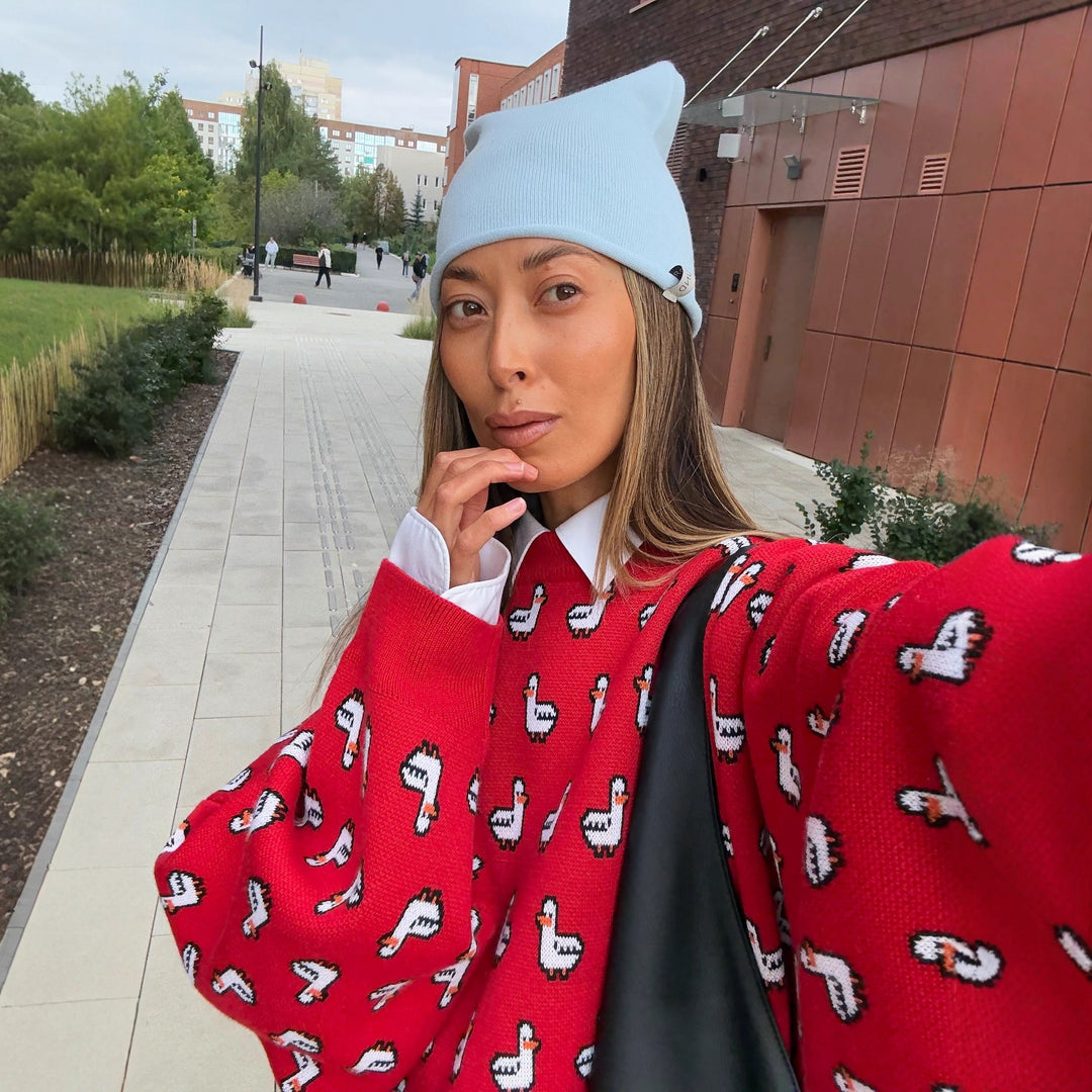 Kvinnesweater med unikt andedesign og løse ermer Skjora