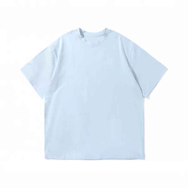 Dame avslappet oversized T-skjorte laget av pustende materiale Skjora