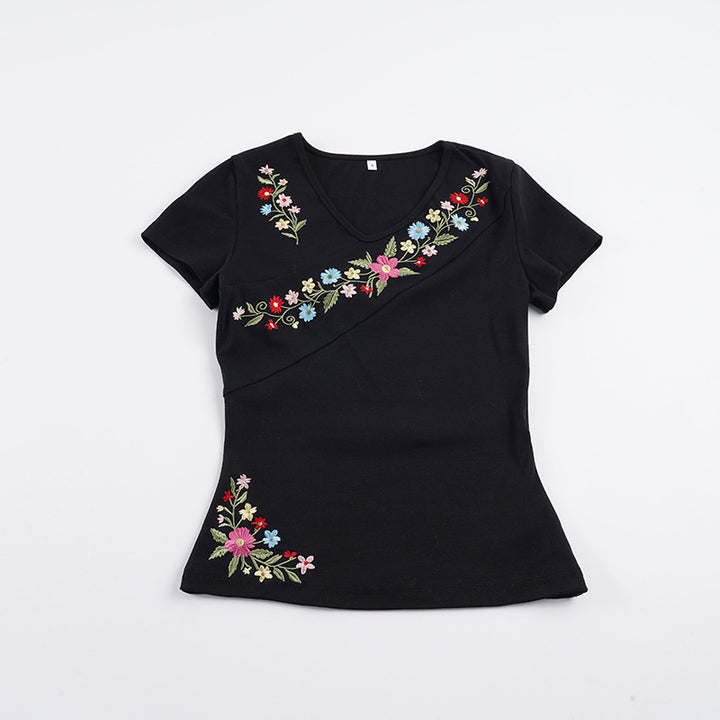 Dame V-hals T-skjorte med floral broderi og kroppsnær passform Skjora