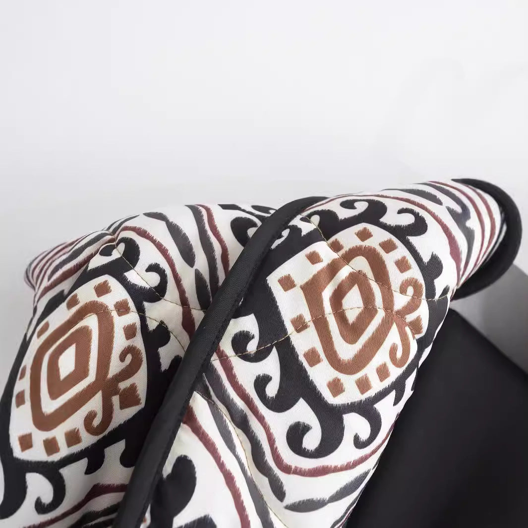 Kvinnes mønstrete quiltet jakke i stilfull oversized design Skjora