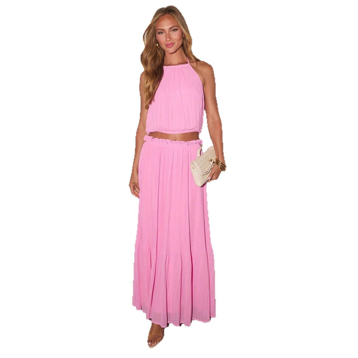 Kvinnens plisserte to-dels sett med crop top og elegant maxi skjørt Skjora