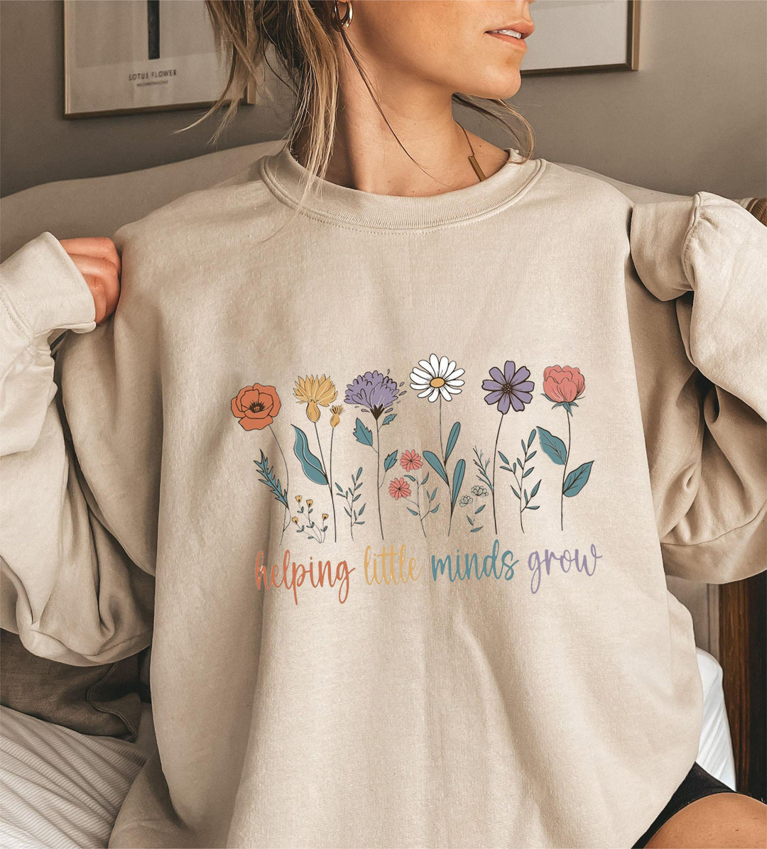 Kvinnesweatshirt med voluminøse ermer og motiverende blomstertrykk Skjora