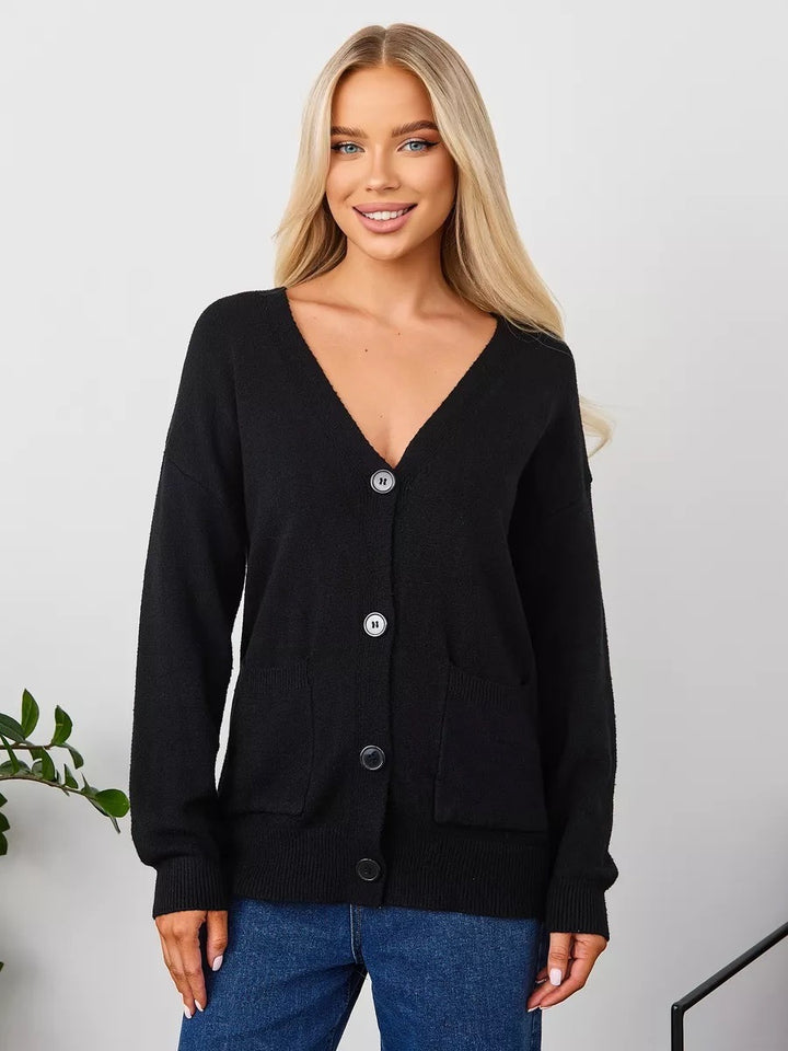 Kvinnens chunky strikket cardigan med dyp V-hals og praktiske lommer Skjora