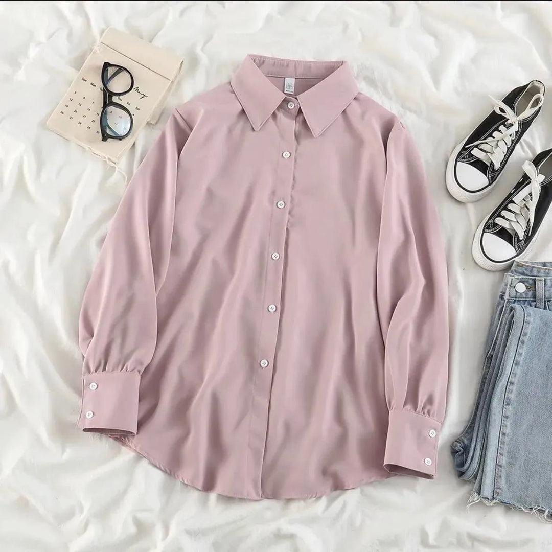 Kvinnens elegante bluse med voluminøse ermer Skjora