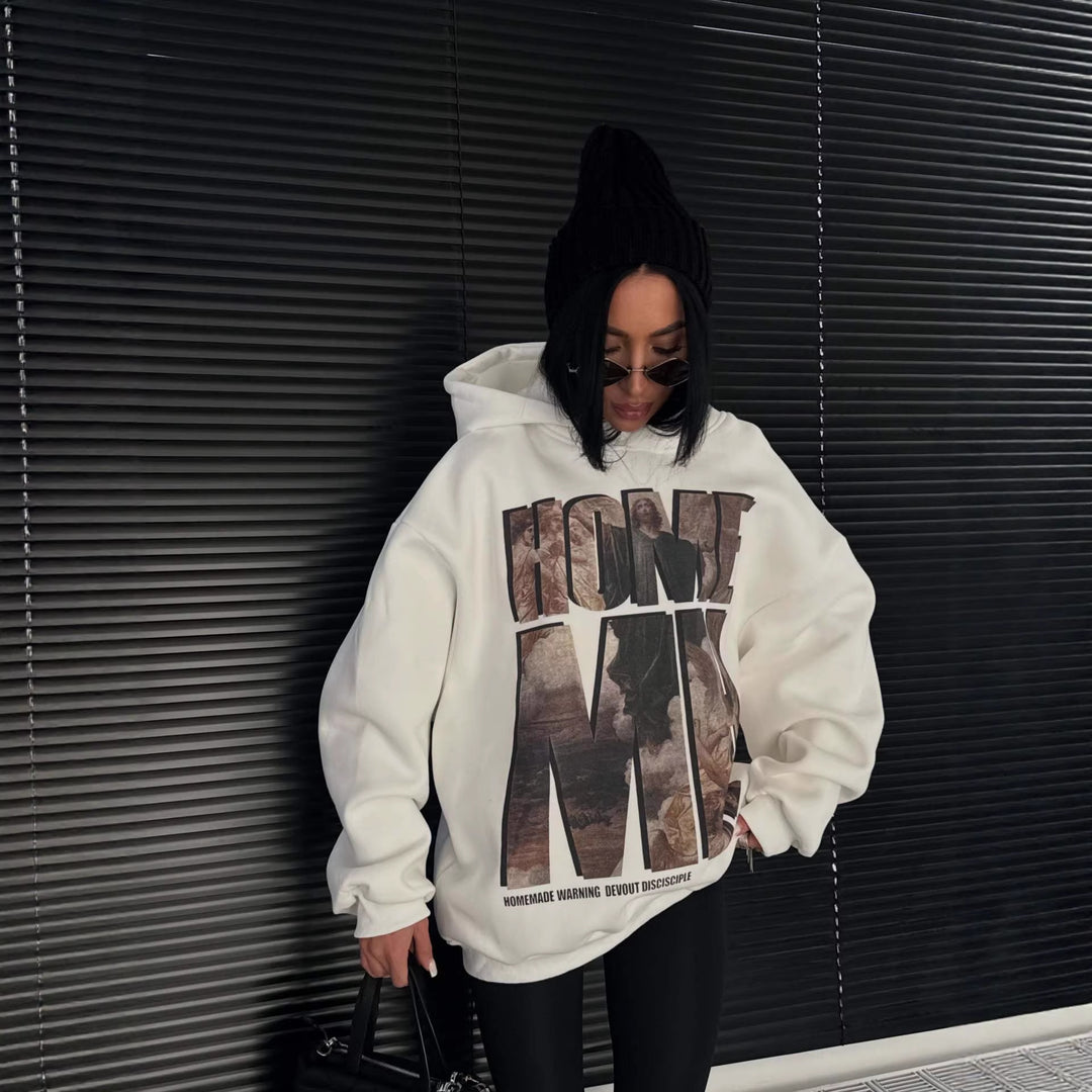 Kvinne oversized hettegenser med fremtredende grafisk trykk Skjora