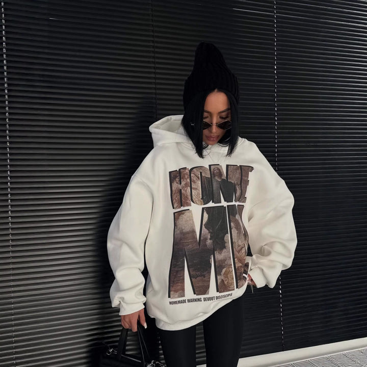 Kvinne oversized hettegenser med fremtredende grafisk trykk Skjora