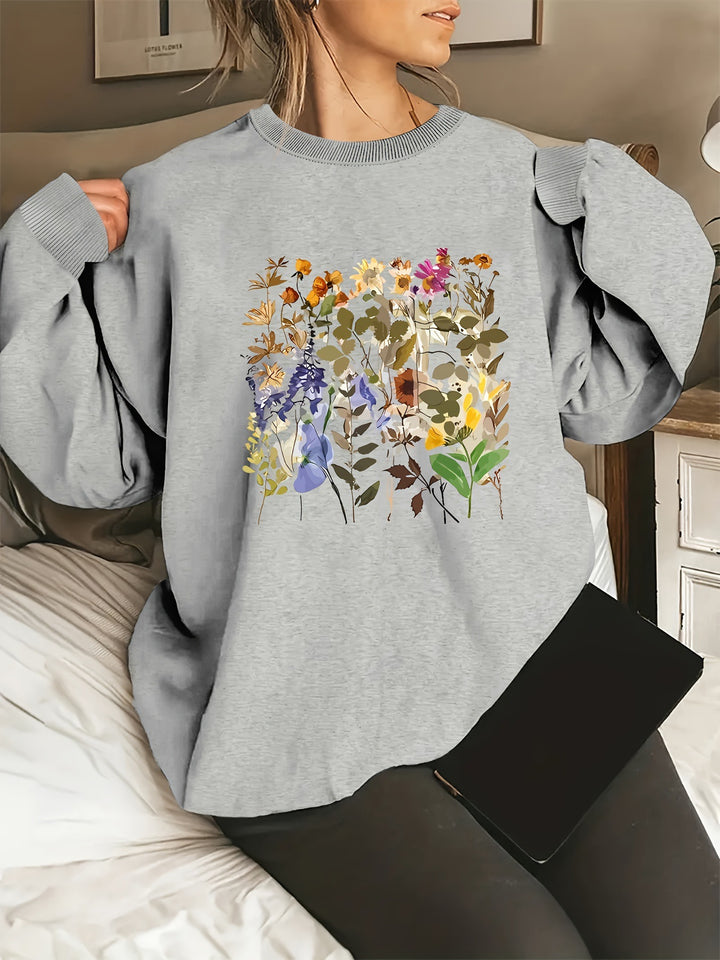 Dame sweatshirt med blomsterdesign og komfortabel passform Skjora