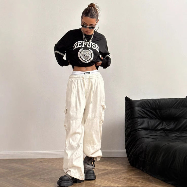 Kvinne Oversized Sweatshirt med Bred Skrift og Dekorative Detaljer Skjora