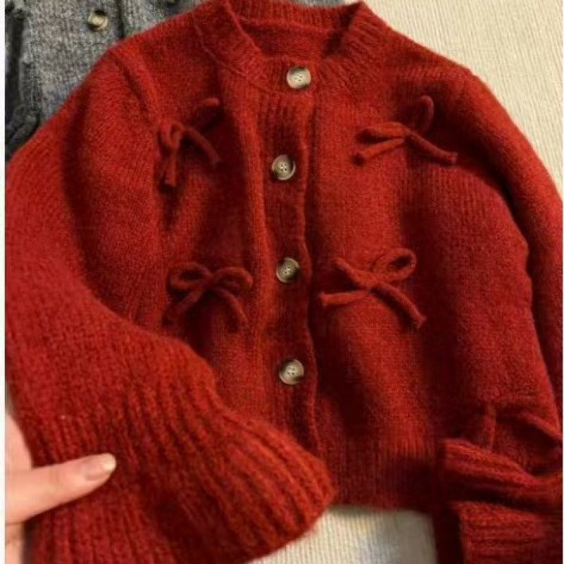 Dame cardigan med dekorative sløyfer på