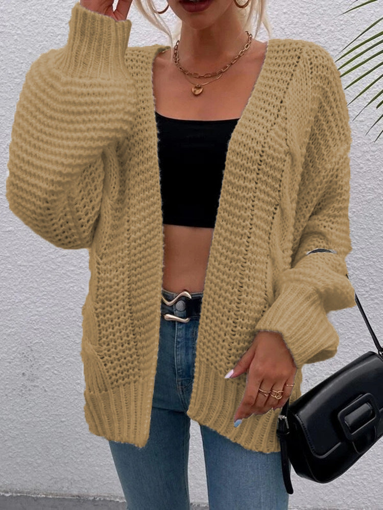 Kvinnens chunky strikket cardigan med komfortable åpne lommer og avslappet passform Skjora