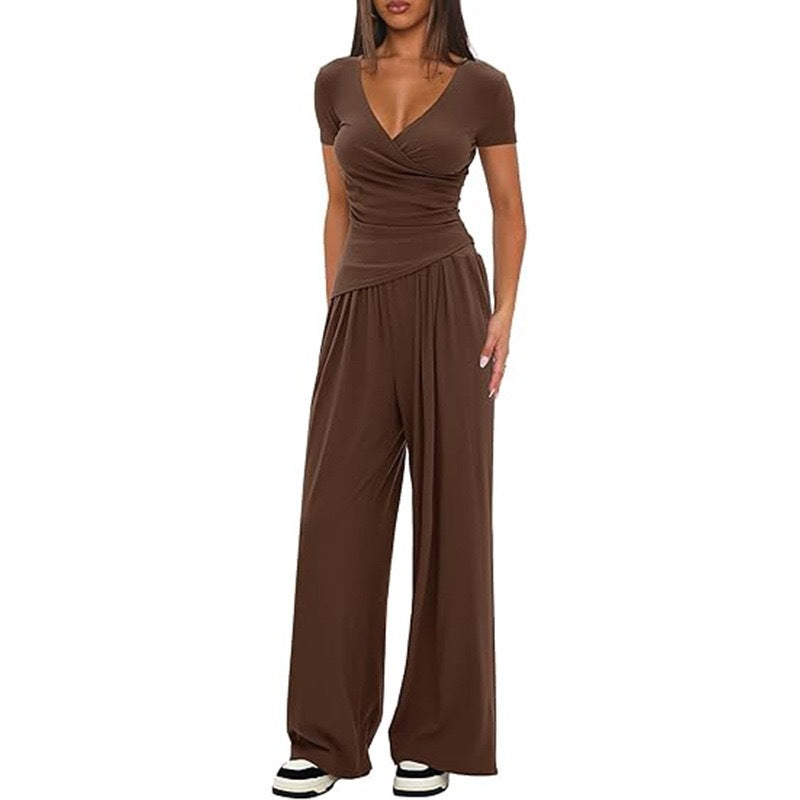 Dame avslappet jumpsuit med omslagsdesign og vid ben Skjora