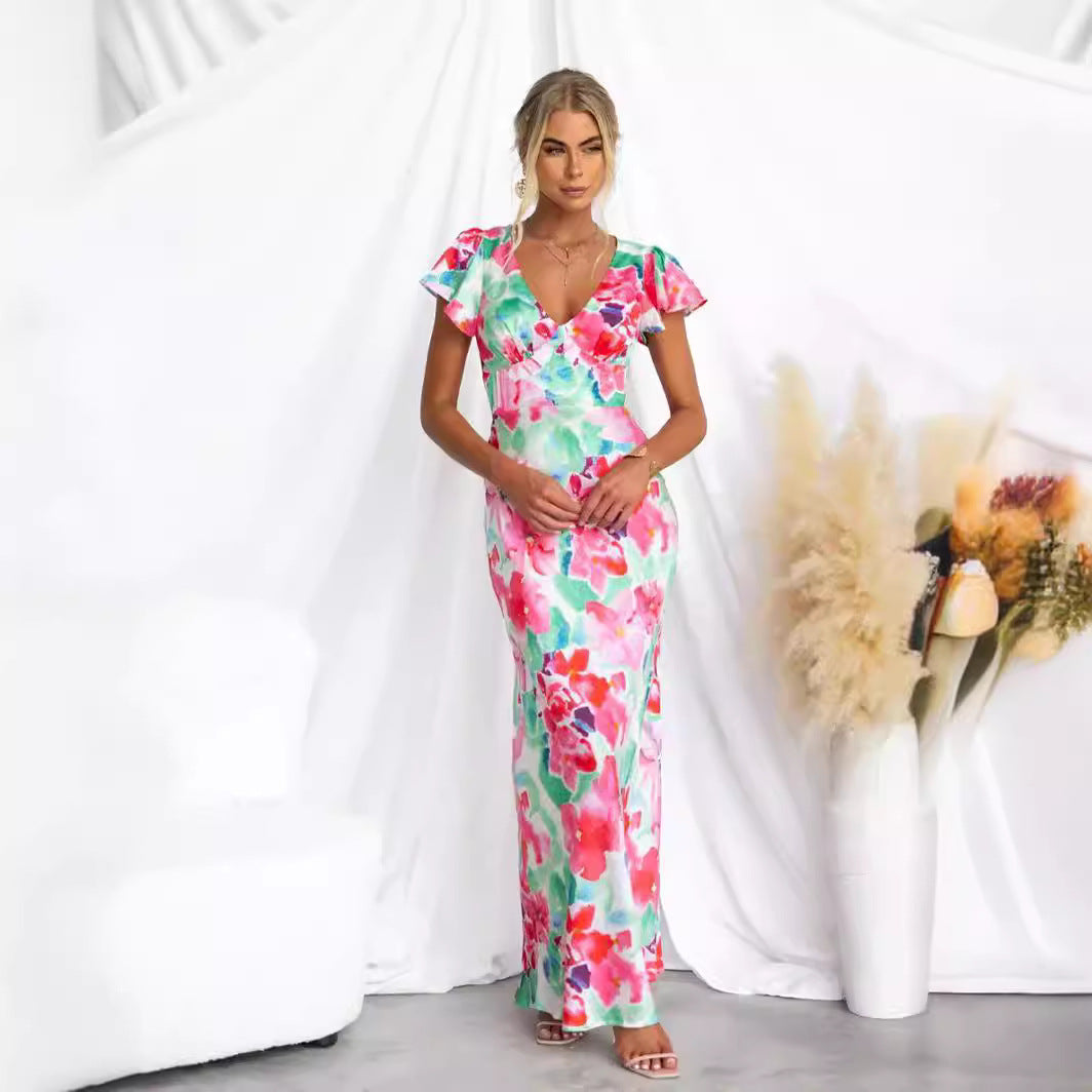Kvinnes maxi kjole med blomsterdesign og flytende silhuett Skjora
