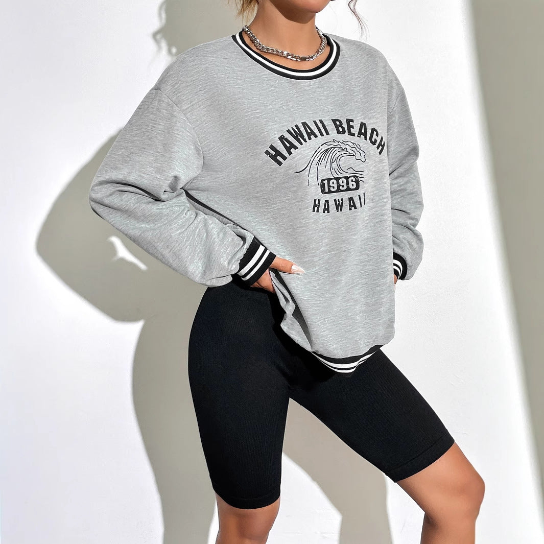 Dame avslappet sweatshirt med trykt Hawaii-motiv og senkede skuldre Skjora