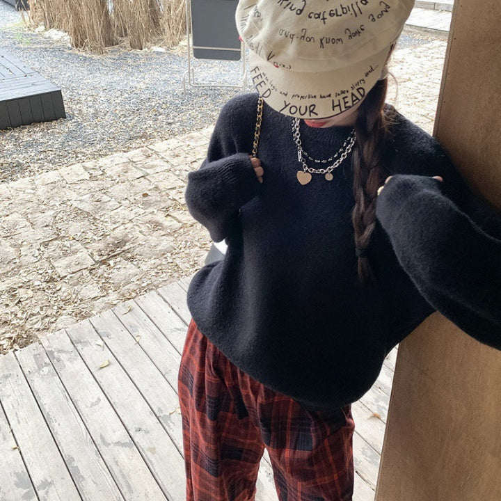 Kvinnes Komfortabel Strikket Genser med Oversized Snitt Skjora