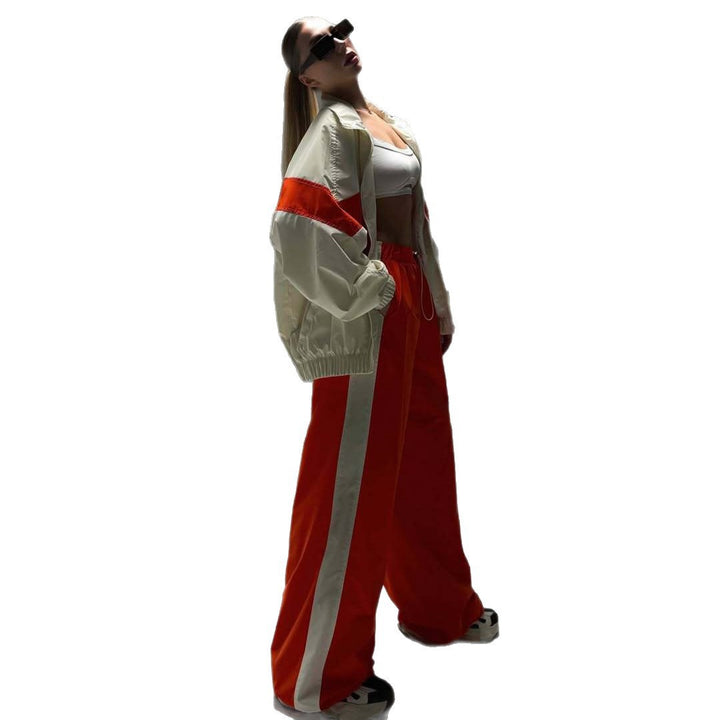 Kvinnelig sporty vindjakke med elastiske mansjetter og reflekterende detaljer Skjora