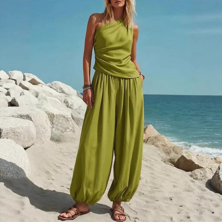 Damer Elegant Einteiler-Outfit med Flytende Snitt og One-Shoulder-Design Skjora