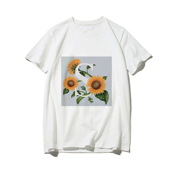 Dame T-skjorte med blomsterdesign og kreativt trykk Skjora