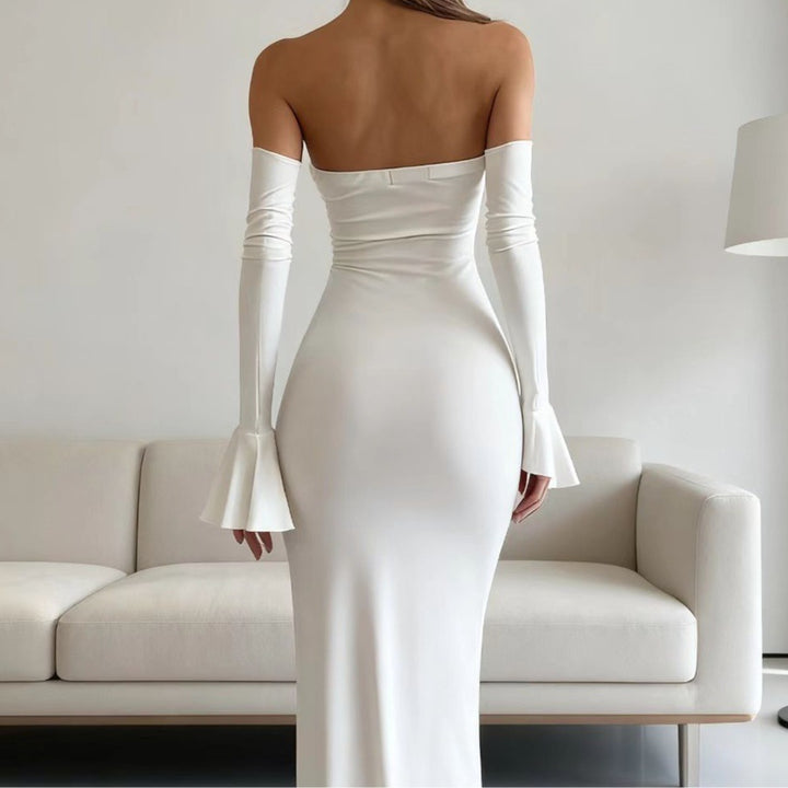 Women's body-hugging off-shoulder evening dress with long sleeves and voluminous cuffs Skjora