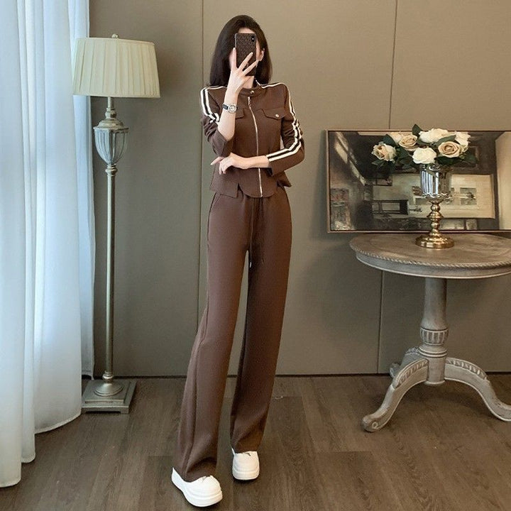 Dame sporty fritidsdress sett med trendy glidelås og vide bukser Skjora