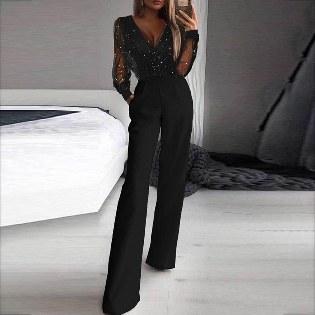 Dame Elegant jumpsuit med transparente ermer og glitrende detaljer Skjora