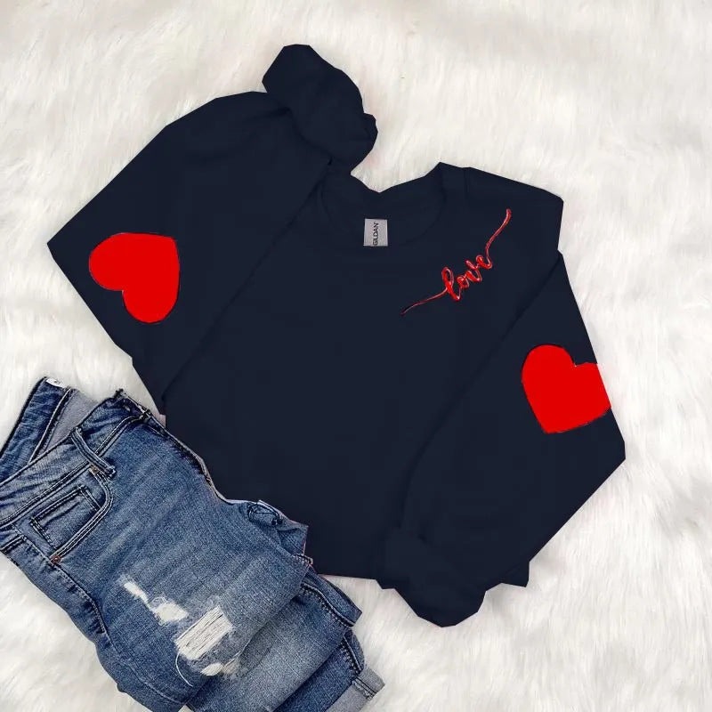 Dame sweatshirt med hjerte design og avslappet passform Skjora
