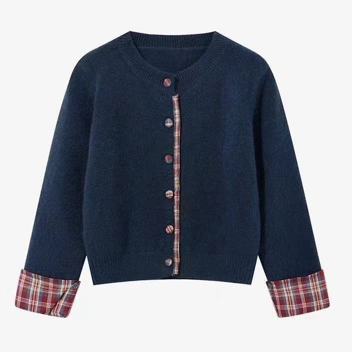 Dame cardigan med rutemønster og elegante knappdetaljer Skjora