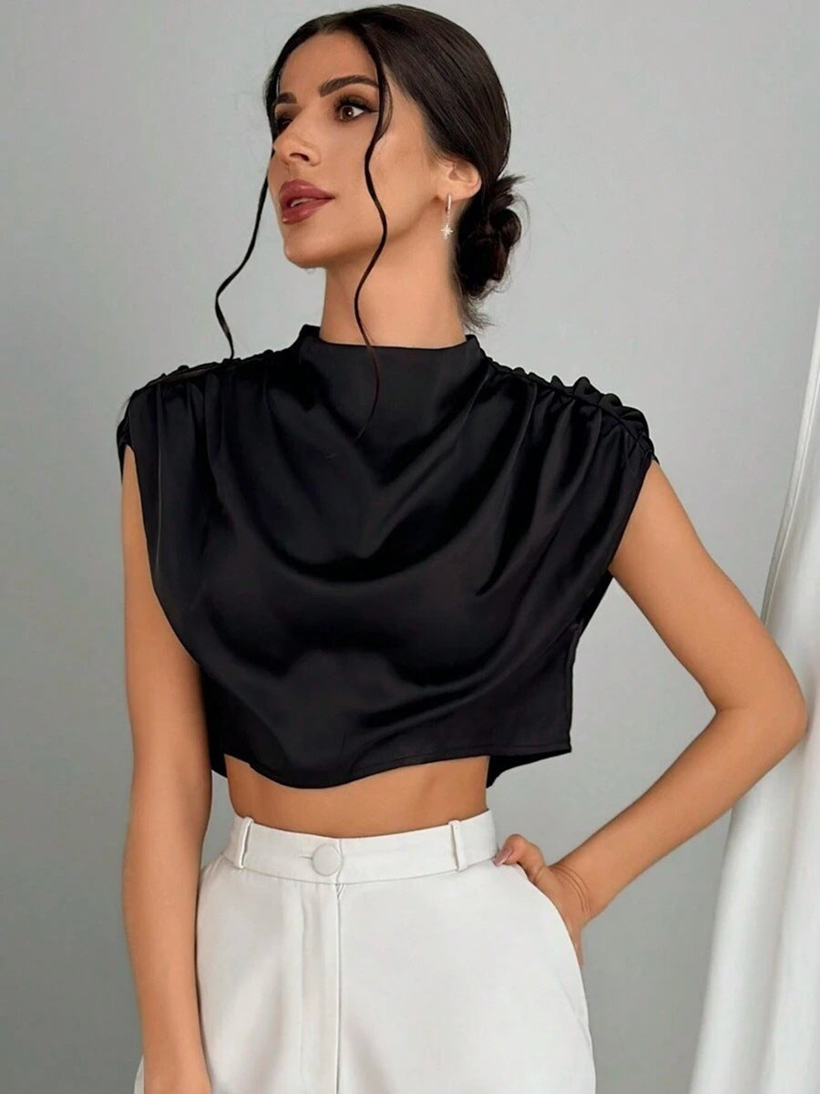 Dame Elegant Crop-Top med voluminøse ermer og edel ryggutskjæring Skjora