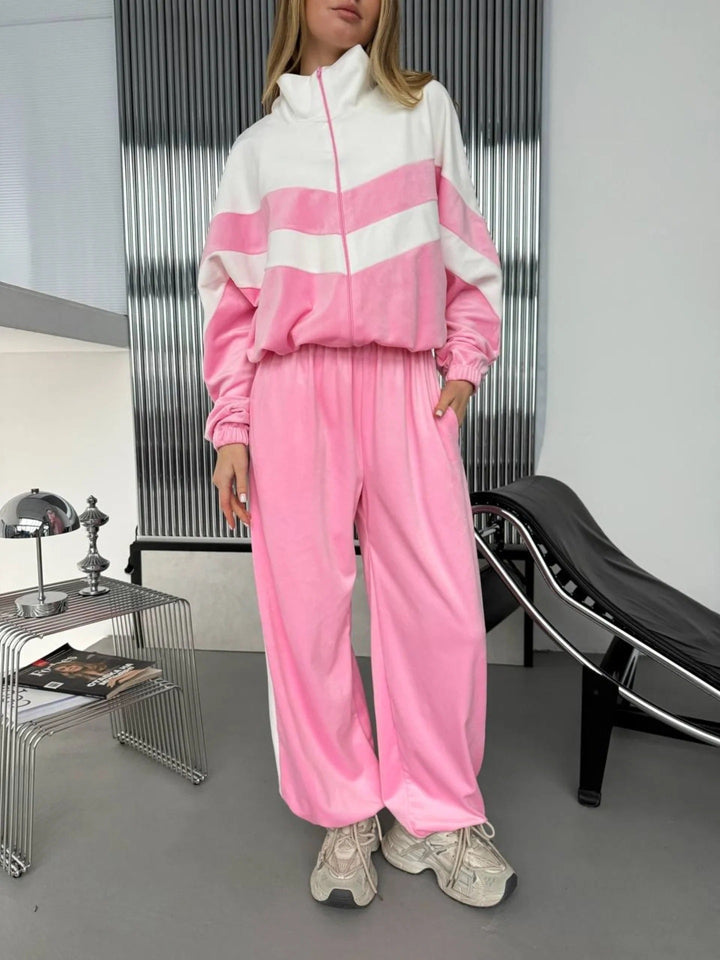 Dame sporty velur treningsdrakt med elegant glidelås og moderne striper Skjora