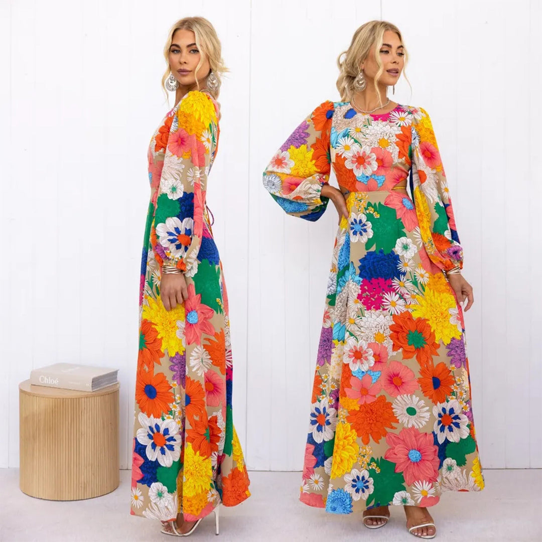 Kvinne blomster maxi kjole med voluminøse ermer og helårs blomstertrykk Skjora