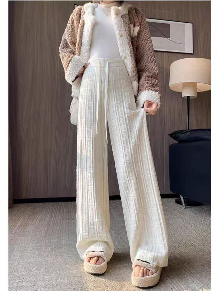 Women's loose summer trousers with elastic waist and fixed stripe pattern Skjora