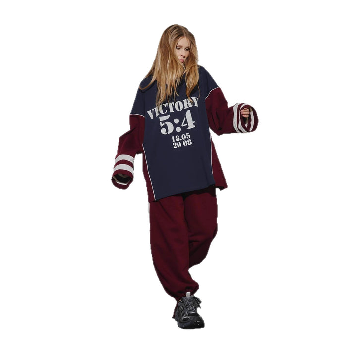 Kvinne Oversized Treningsdrakt med Grafisk Trykk og Bred Bukse Skjora