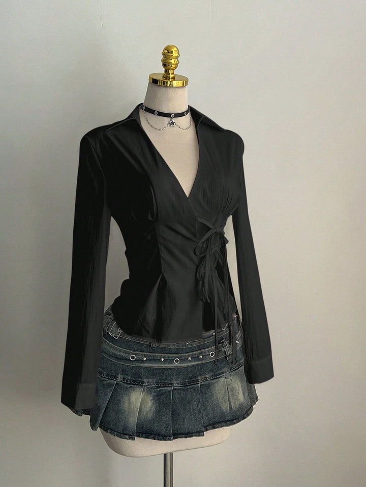 Damer Elegant omslagsbluse med fine volangdetaljer Skjora