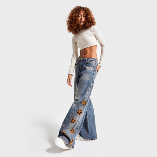 Women's wide-leg jeans with floral print Skjora
