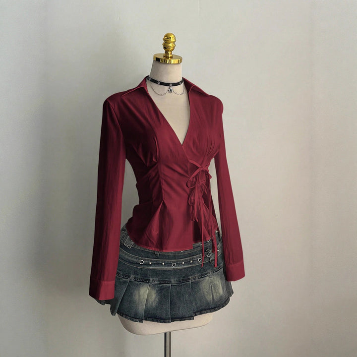 Damer Elegant omslagsbluse med fine volangdetaljer Skjora