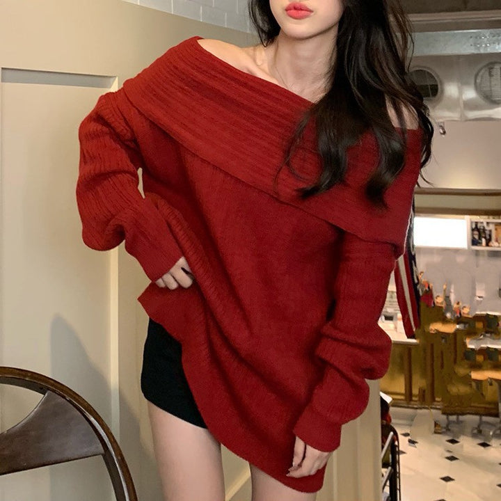 Kvinnelig oversized genser med avslappet off-shoulder design og fin ribbestruktur Skjora