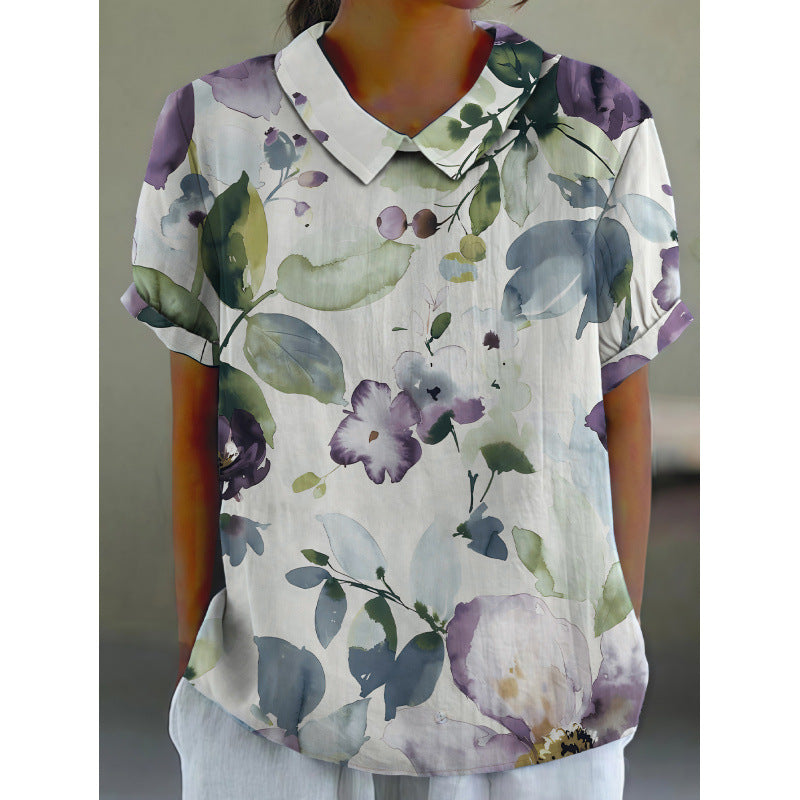 Dame kortermet bluse med florale accenter og klassisk krage Skjora