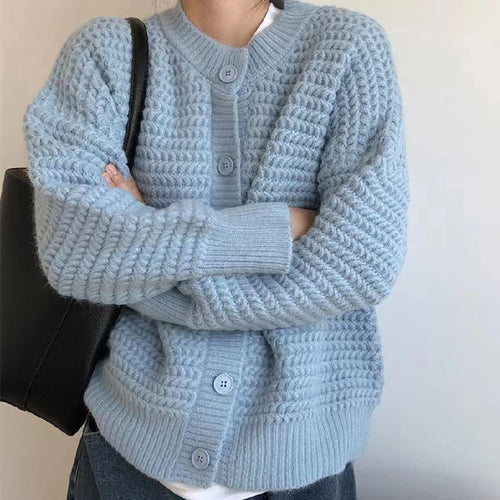 Kvinnes chunky strikket cardigan med dekorative knapper og avslappet snitt Skjora
