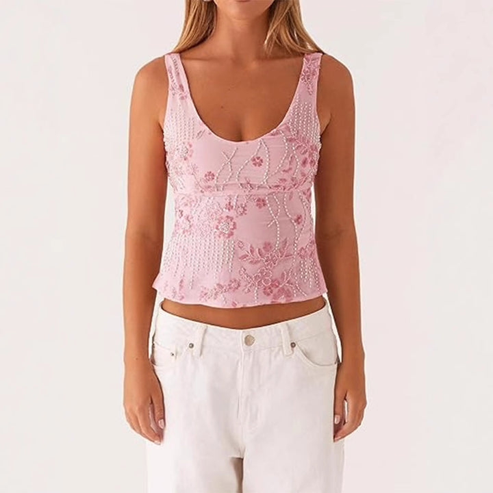 Damescouture topp med blomstret rhinestonesdesign og tettsittende snitt