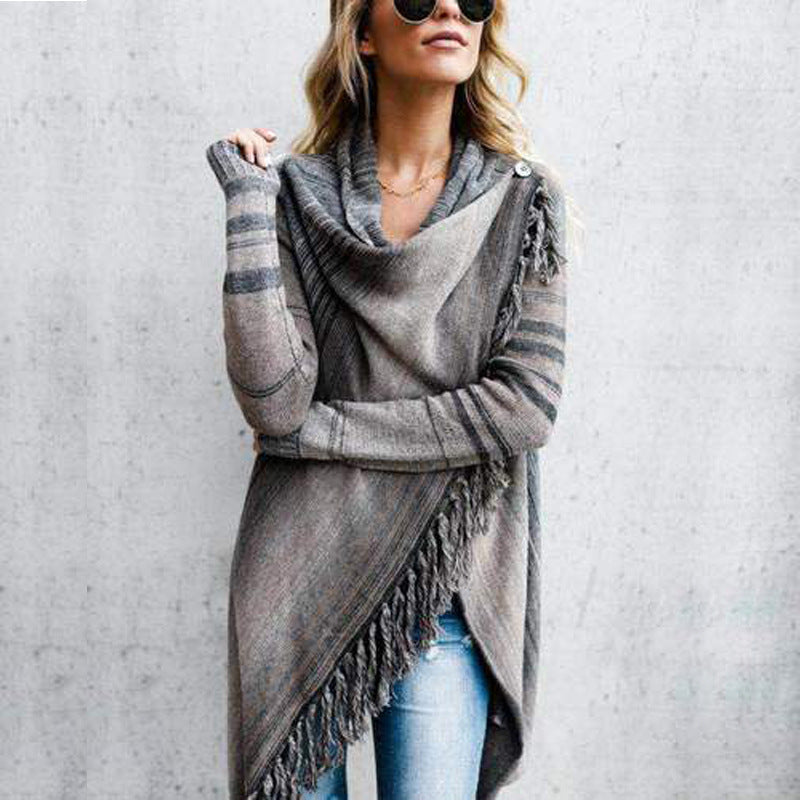 Kvinnens koselige poncho med frynser Skjora