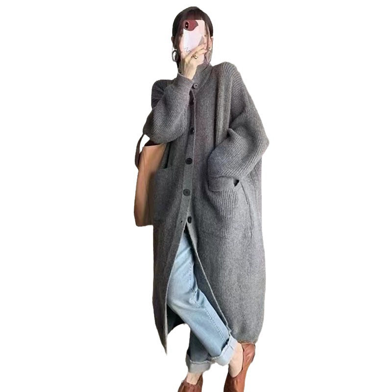 Kvinnens chunky strikk cardigan med knappeåpning og dype lommer Skjora