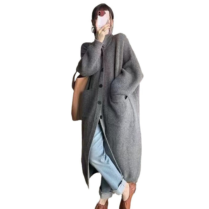 Kvinnens chunky strikk cardigan med knappeåpning og dype lommer Skjora