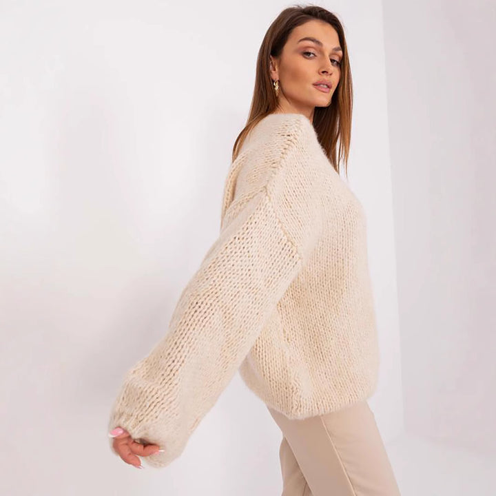 Kvinne chunky strikkegenser med oversized passform og brede ermer Skjora